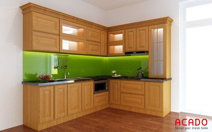 Nếu bạn có một không gian bếp vừa phải, tận dụng không gian góc thì mẫu tủ bếp chữ L