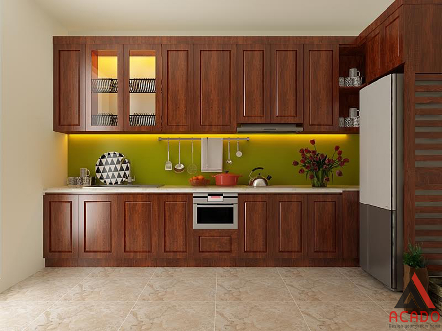 Tủ bếp chữ i gỗ xoan đào màu cánh dán đậm mang lại sự ấm cúng cho căn bếp