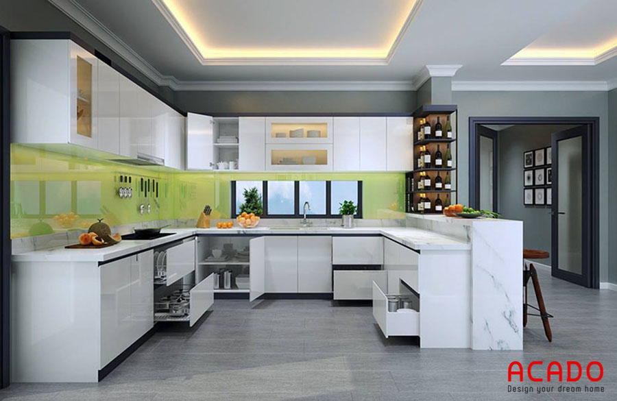 Tủ bếp acrylic thiết kế kết hợp quầy bar dành cho căn bếp rộng rãi, giúp cho thao tác nấu nướng thoải mái