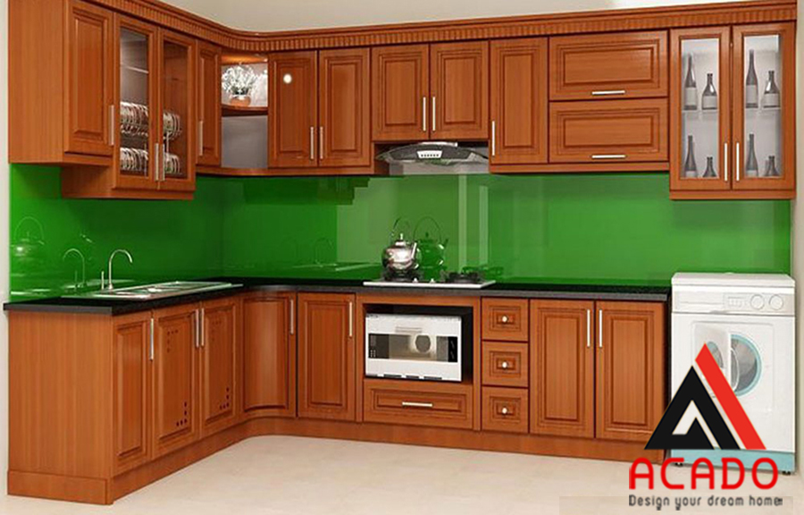 Tủ bếp gỗ Xoan Đào với màu cánh dán đặc trưng mang lại không gian bếp sang trọng, lịch lãm