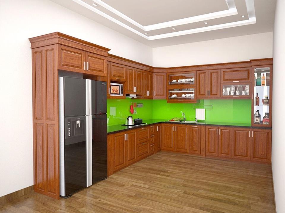Tủ bếp gỗ xoan đào chữ L sơn màu cánh gián nhạt cho căn bếp thêm ấm cúng.