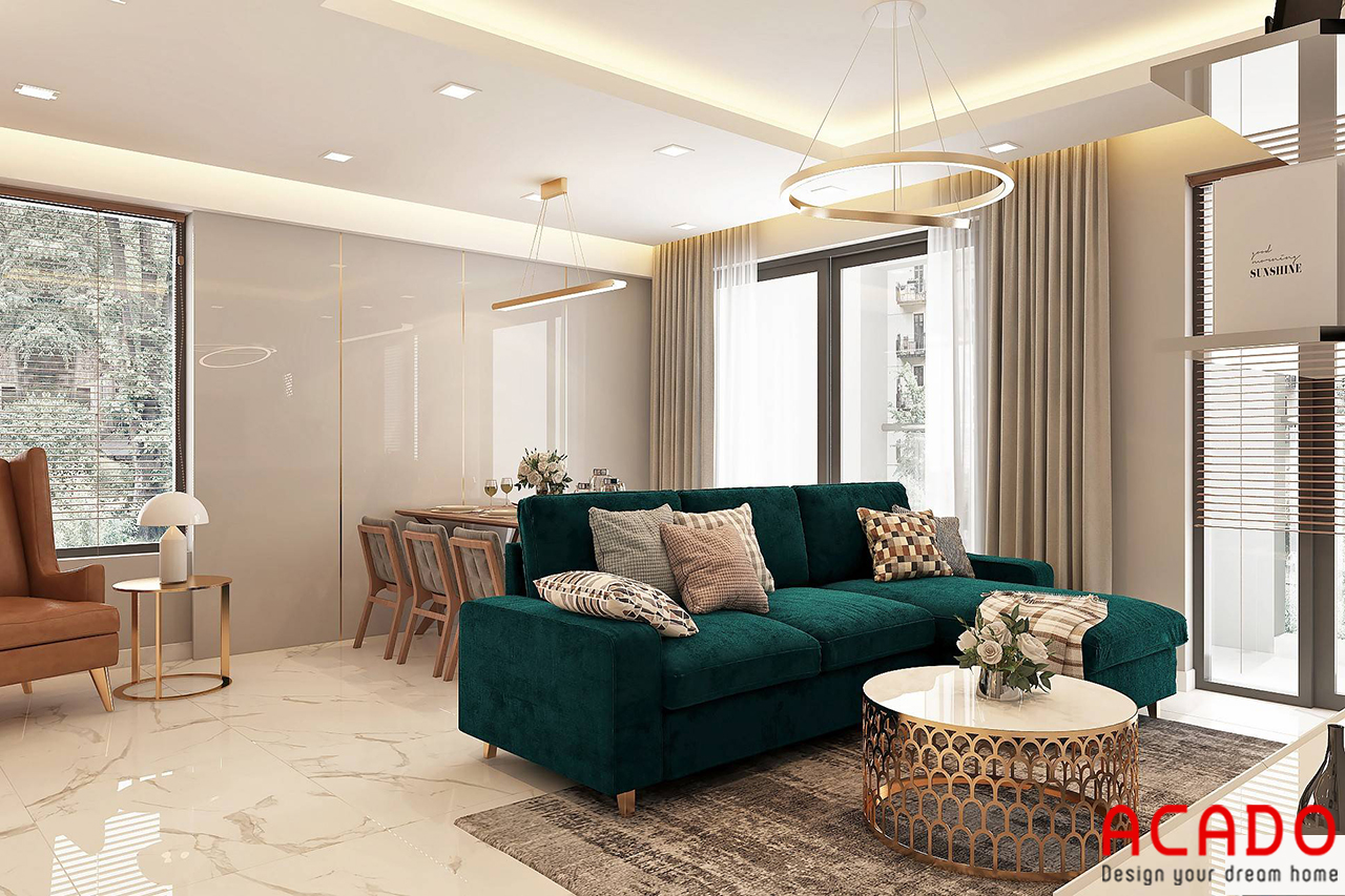 Phòng khách thiết kế phong cách hiện đại, điểm nhấn là bộ sofa nhung màu xanh rêu